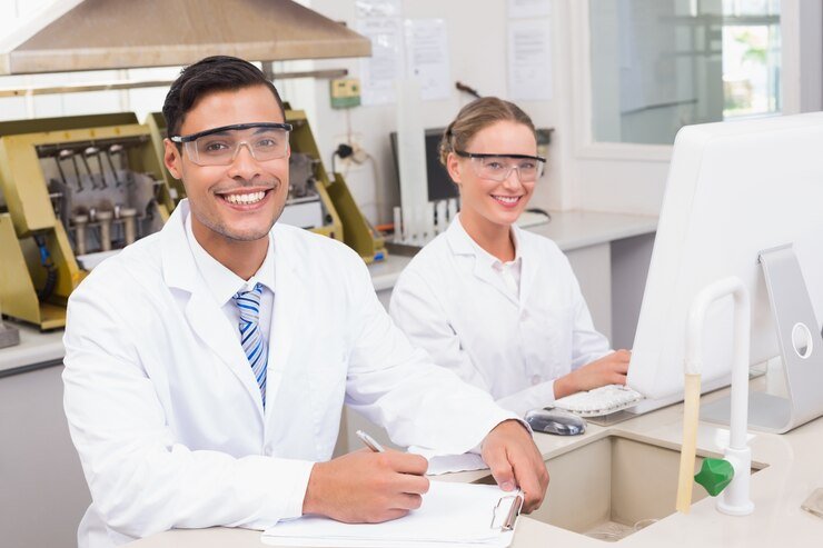 smiling scientists looking camera 13339 115210