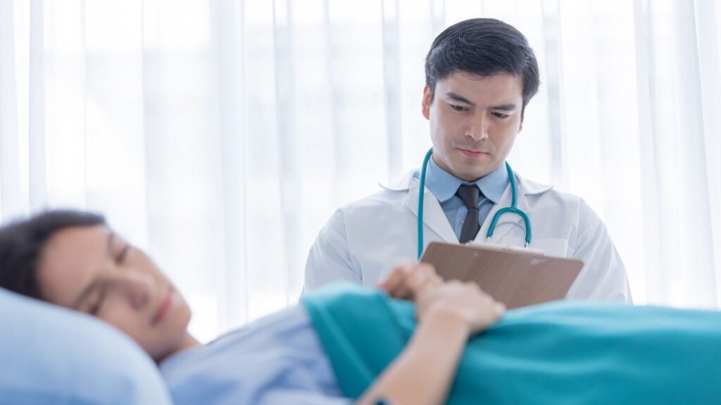 Doctor observing patient